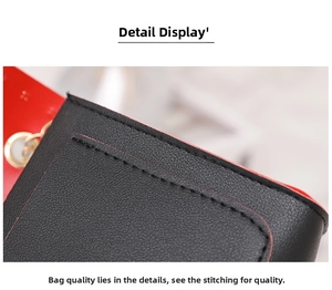 Macro shot of durable black leather texture with red lining and precise stitching detail