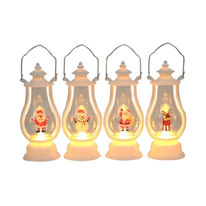 Set of four white Christmas LED lanterns with warm light and festive holiday figurines