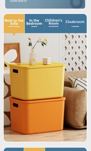 Stackable plastic storage bins with handles in matte orange and yellow for home organizing