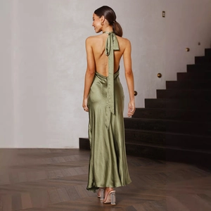 Detail of olive green satin halter dress featuring elegant backless design and silky texture