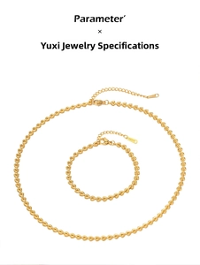 Detail of 18k gold plated stainless steel heart link necklace and bracelet set