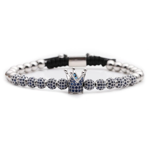 Close-up of crown braided bracelet with blue cubic zirconia and silver micro-pave beads