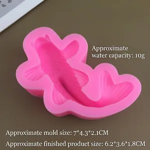 Detail view of pink silicone koi fish mold with fine texture for baking and DIY crafts