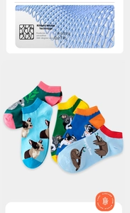 Detailed view of elastic ribbed cuffs on five-pack colorful animal cotton ankle socks