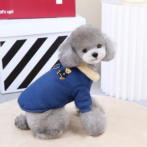 Detail of warm navy pet vest with sherpa collar, bear embroidery, and leash D-ring attachment