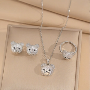 Detail of bear jewelry set with necklace, earrings and adjustable ring with zircons
