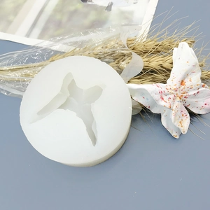 3D butterfly silicone mold for fondant and chocolate baking on a minimalist background