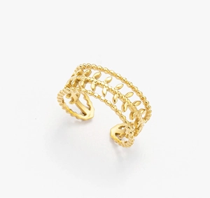 Detail of adjustable gold ring with olive leaf pattern and beaded edge design