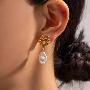 Elegant 8K gold stainless steel earrings with baroque pearls and evil eye flower design