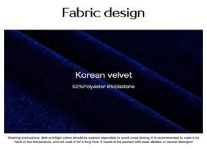 Detailed view of navy blue velvet fabric with washing instructions for long maxi dress