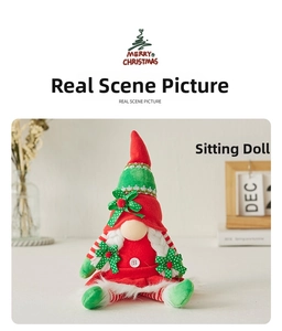 Detail of Christmas sitting gnome doll with red striped hat and long white braids