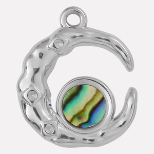 Macro detail of crescent moon pendant with iridescent abalone shell and zircon accents