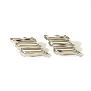 Polished silver stainless steel angel wing stud earrings on a clean white background