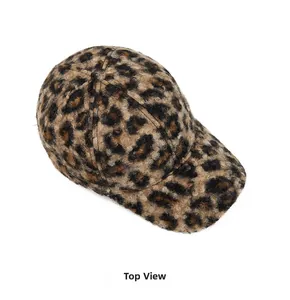 Top view detail of plush leopard print baseball cap with warm faux fur texture