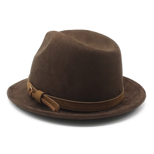 Detail of coffee brown suede fedora featuring a leather band and metal buckle accent