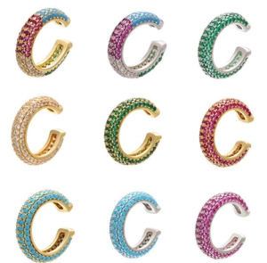 Detail of colorful pave-set zircon C-shaped ear cuffs in various plating finishes