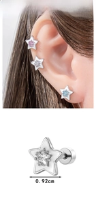 Detail view of 0.92cm star ear studs with colorful oil drip and central zircon stone