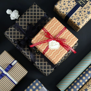 Deep blue and kraft paper gift wrap set with grid patterns and elegant ribbons