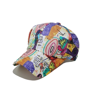 Colorful street graffiti print baseball cap featuring artistic text and trendy patterns