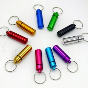 Portable mini aluminum waterproof pill box keychain set in ten vibrant anodized colors