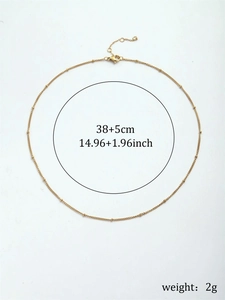 Detailed view of 18K gold plated bead chain with 38+5cm size and 2g weight specs
