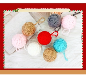 Detail of 5cm colorful knit yarn balls with hanging loops for Christmas DIY decor