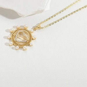 French vintage gold heart pendant necklace with pearls and sparkling cubic zirconia stones