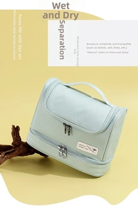 Detail of mint green waterproof travel bag with double layer storage and zipper