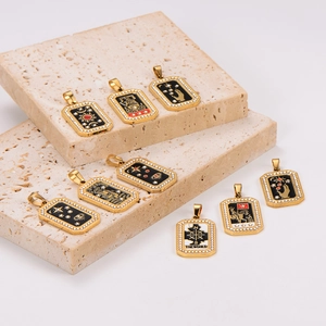 Gold stainless steel tarot card pendants with enamel inlay and diamonds on travertine stone