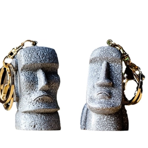Easter Island Moai stone statue keychain with speckled texture and gold ring