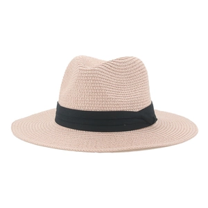 Classic beige straw panama hat with black ribbon, sun protection for beach vacations