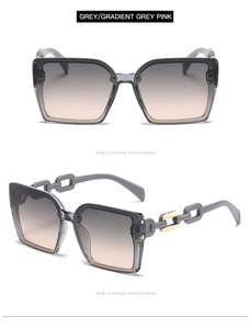 Detail view of square sunglasses with gradient lenses and gold chain temple design