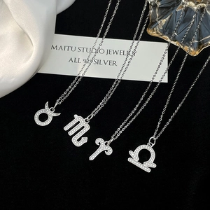 S925 Sterling Silver Zodiac Necklace with Zirconia Pendants on a black velvet background
