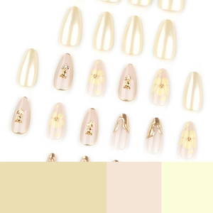 Faux ongles 3D rose dorée champagne en forme d'amande avec finition perlée