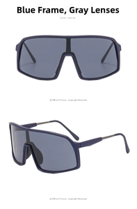 Detail view of sports sunglasses featuring a blue frame and large grey integrated lens