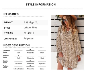 Detail view of the lightweight leopard print polyester fabric texture and sleeve pattern