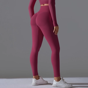 Close-up of seamless magenta high waist leggings with scrunch butt lifting detail