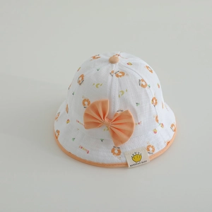 Chapeau soleil pour bébé avec nœud orange et motif donut en coton blanc respirant
