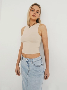 Detailed view of the ribbed knit fabric texture on the beige Y2K cropped tank top