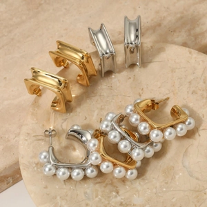 Elegant C-shaped pearl and polished stainless steel hoop earrings set in gold and silver