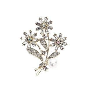 Elegant silver flower bouquet brooch with white pearl and sparkling crystals on white background