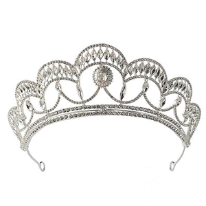 Close-up of vintage bridal crown with baroque crystals and silver metal detailing