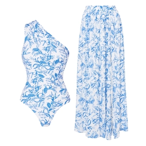 Blue and white floral one-shoulder swimsuit set with high-waisted maxi skirt for women