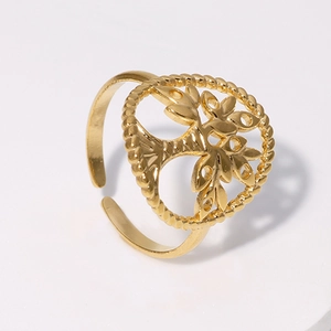Detailed close-up of golden Tree of Life open ring with twisted texture and hollow design