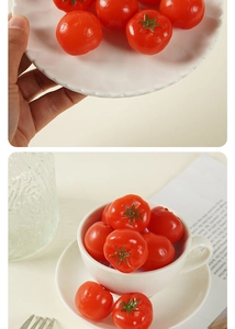 Close-up of realistic PVC cherry tomato model with shiny red finish and green stem detail