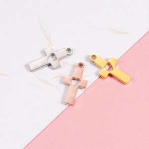 Three mirror-polished stainless steel cross pendants with hollow heart design in gold and silver