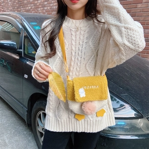 Detail of cute lamb wool duck crossbody bag featuring SOZAKKA embroidery and fuzzy texture