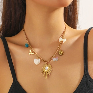 Gold plated stainless steel necklace with sun, butterfly, and bird multi-element pendants