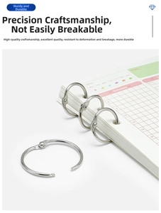 Close-up of silver metal loose-leaf binder rings in open and closed states for notebook