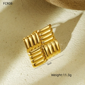Top view of gold-plated stainless steel ring with hammered texture and vertical stripes